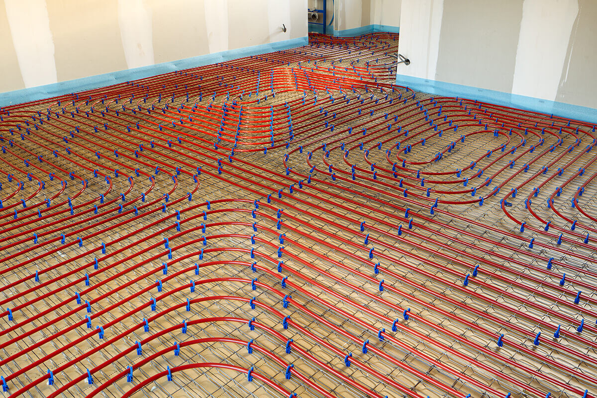 plancher-chauffant-chauffage-sol-tuyaux-logement